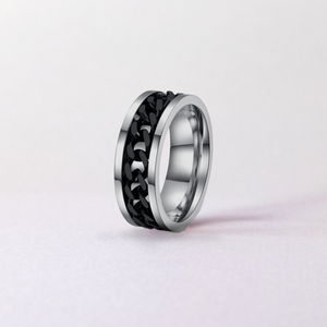 Black chain spinner over silver ring